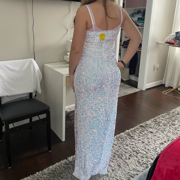 White, iridescent prom dress. Has sequins and lining in the chest area. - Picture 2 of 2